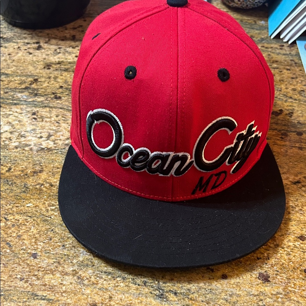 KBETHOS Red Cap with Black Accents Ocean City MD logo